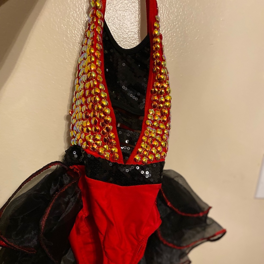 Glamour Black, red, and gold dance costume